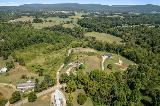 aerial view featuring a view of trees