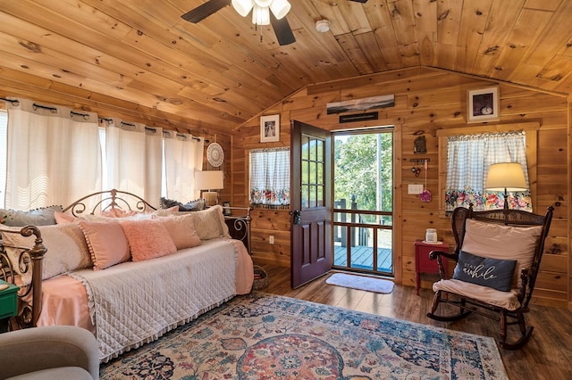 bedroom with hardwood / wood-style flooring, wood ceiling, and access to outside