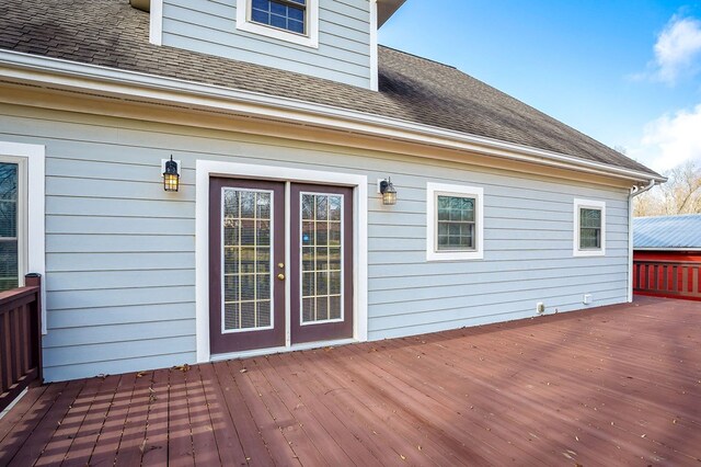 wooden deck featuring french doors