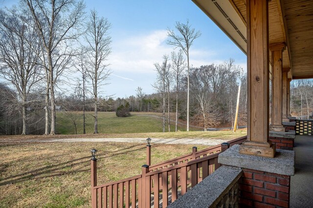 view of yard with covered porch