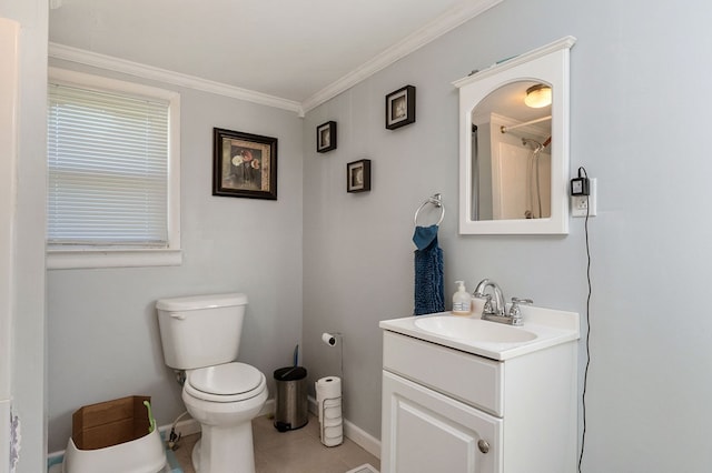 full bathroom featuring tile patterned flooring, toilet, vanity, baseboards, and crown molding