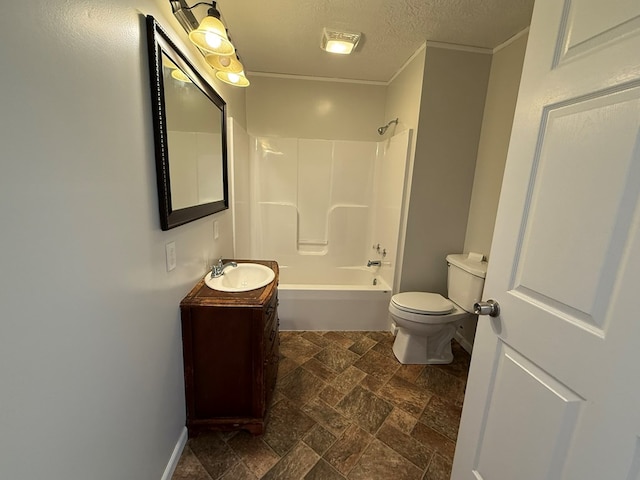 full bath featuring toilet, stone finish flooring, bathtub / shower combination, a textured ceiling, and vanity