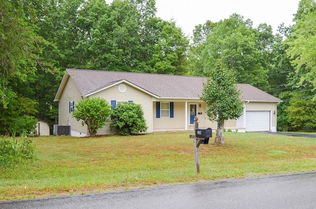 ranch-style home featuring a storage shed, crawl space, central AC unit, and a front lawn