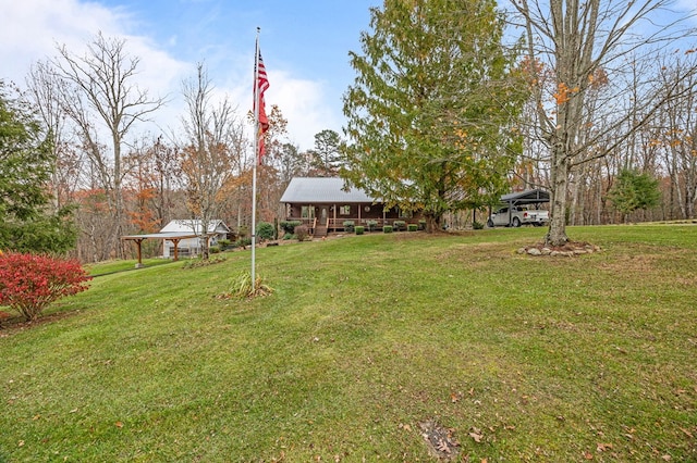 view of yard with a carport