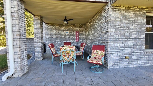 view of patio / terrace featuring ceiling fan and outdoor dining area