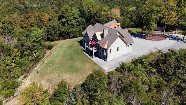 bird's eye view featuring a view of trees