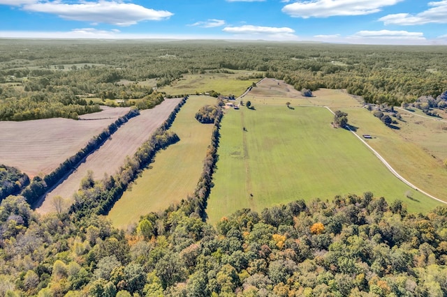 aerial view featuring a wooded view