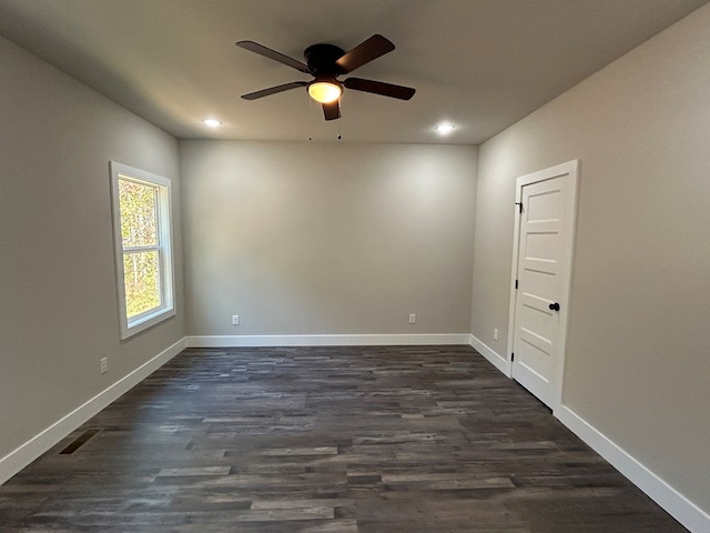 unfurnished room featuring dark wood-style floors, recessed lighting, ceiling fan, and baseboards