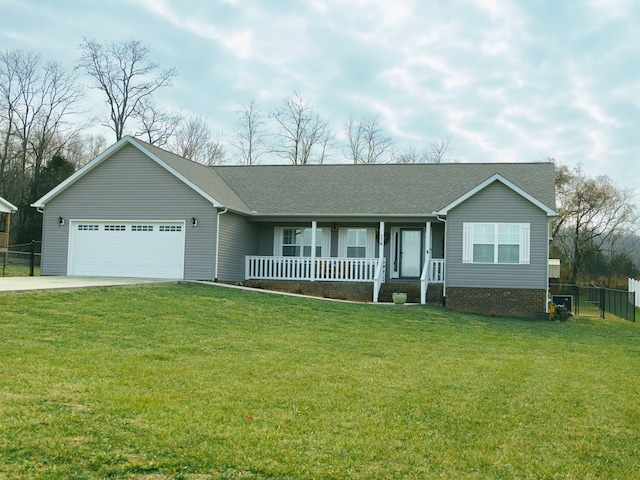 ranch-style house featuring driveway, covered porch, an attached garage, and a front lawn