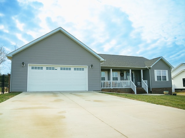 ranch-style house with an attached garage, a porch, and concrete driveway