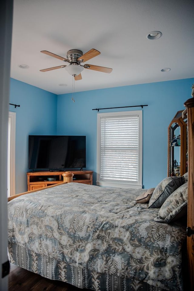 bedroom with a ceiling fan and recessed lighting