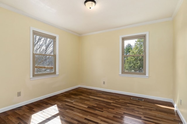 unfurnished room featuring dark wood-type flooring, a healthy amount of sunlight, and baseboards