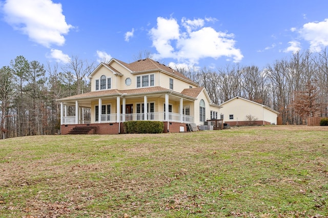 view of front facade featuring crawl space, covered porch, and a front lawn