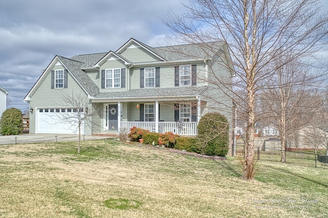 view of front of property with covered porch, driveway, a front yard, and a garage