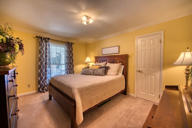 bedroom featuring light carpet, crown molding, and a textured ceiling