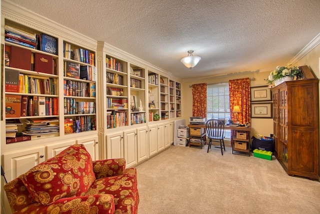 living area with carpet, crown molding, and a textured ceiling