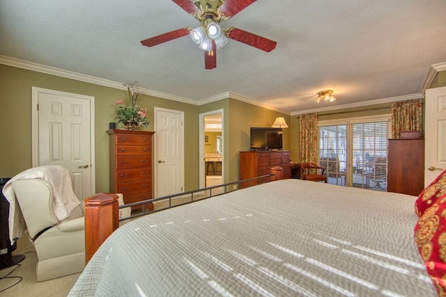 carpeted bedroom with a textured ceiling, a ceiling fan, and crown molding