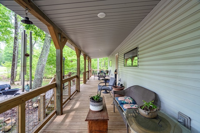 deck with covered porch