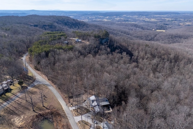 bird's eye view with a view of trees