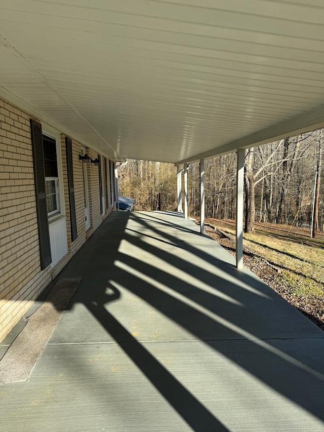 view of patio / terrace featuring a carport