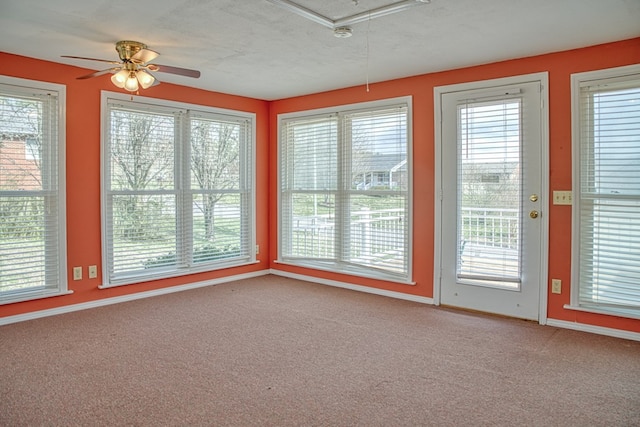 interior space with a ceiling fan