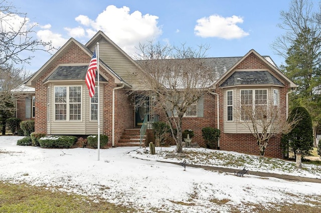 view of front of home featuring brick siding