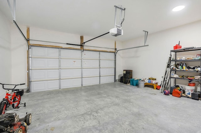 garage featuring a garage door opener