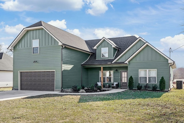 view of front facade featuring concrete driveway, an attached garage, covered porch, board and batten siding, and a front yard