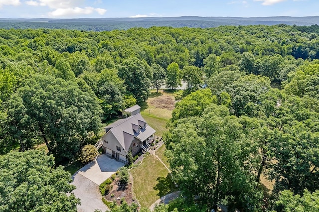 aerial view featuring a forest view