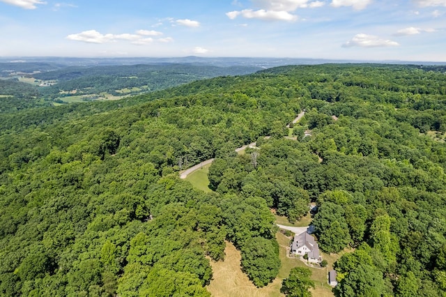 drone / aerial view with a view of trees