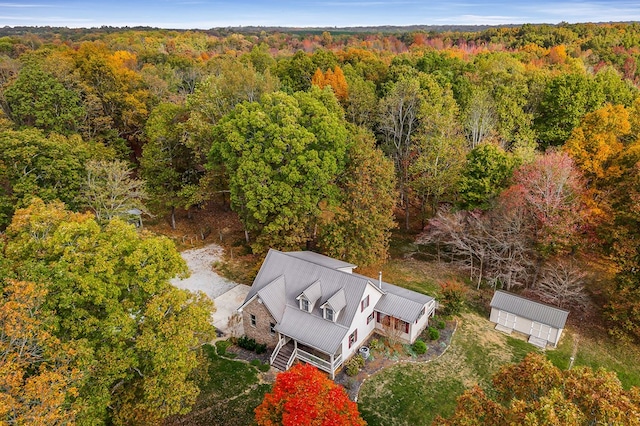 drone / aerial view with a view of trees