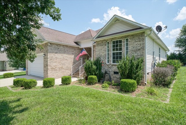 ranch-style house with brick siding, crawl space, an attached garage, and a front yard