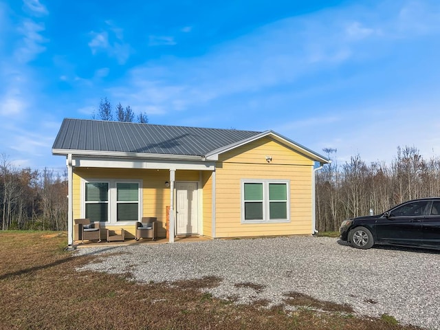 exterior space with metal roof