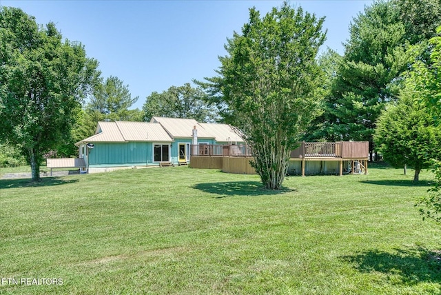 view of yard with a deck