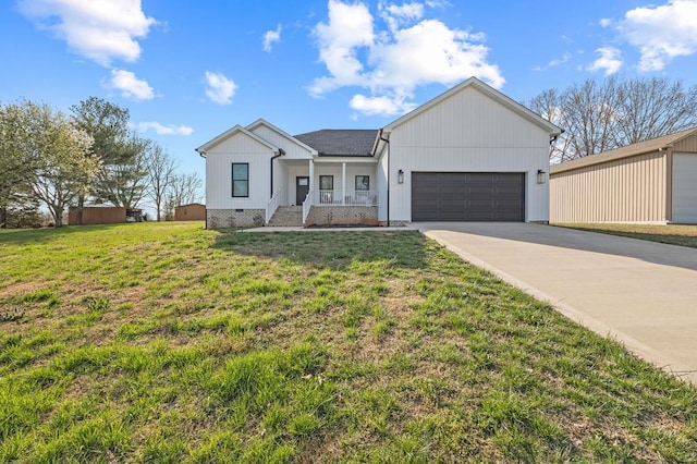view of front of property featuring roof with shingles, concrete driveway, a garage, a front lawn, and a porch