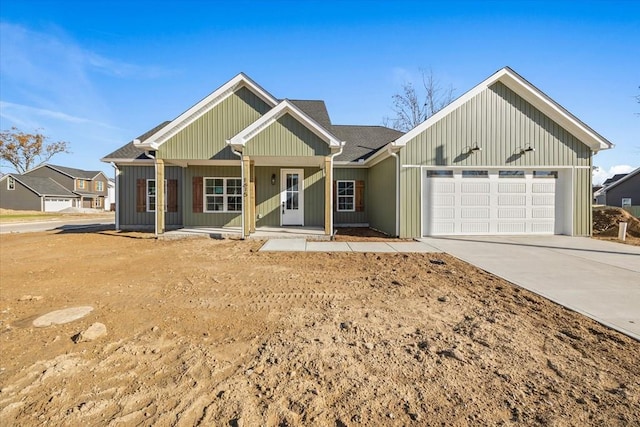 view of front of house featuring a garage and concrete driveway