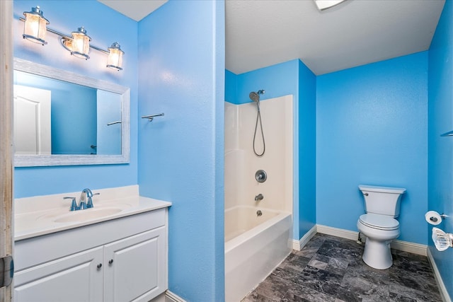 bathroom featuring toilet, bathtub / shower combination, baseboards, and vanity