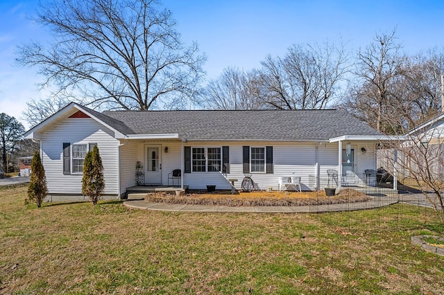 single story home with a shingled roof and a front yard