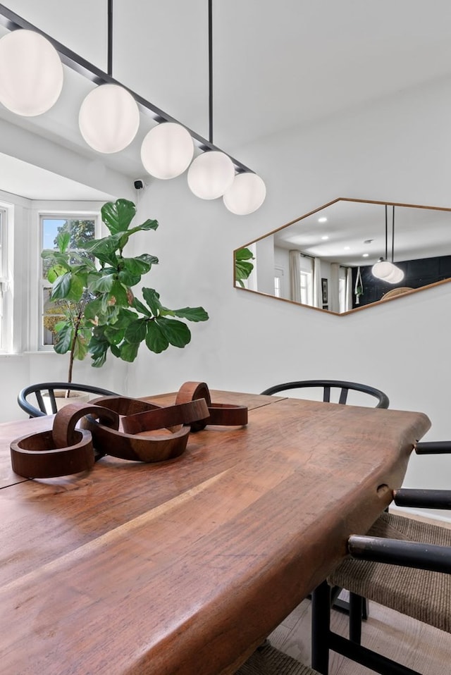 dining room with wood finished floors