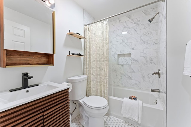 full bath with tile patterned flooring, vanity, toilet, and shower / bath combo with shower curtain