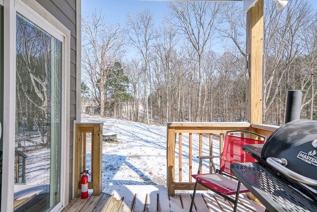 view of snow covered deck