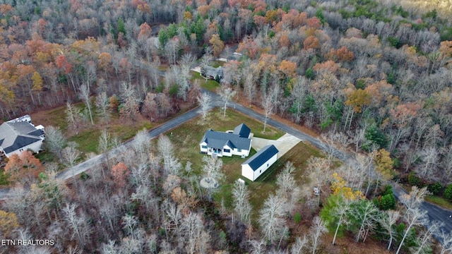 aerial view featuring a forest view