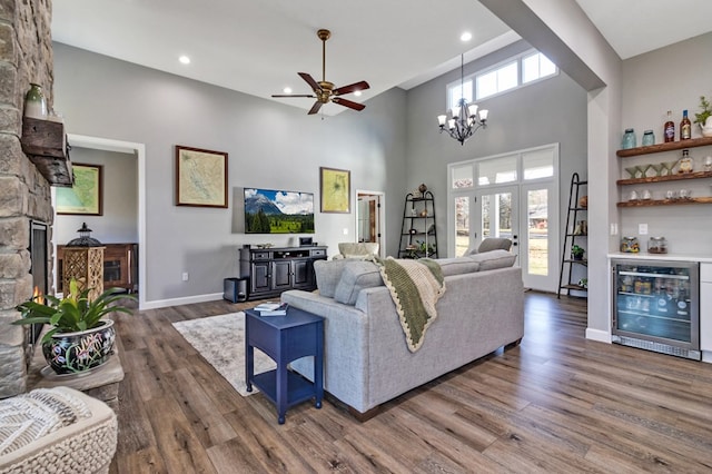 living room featuring a dry bar, plenty of natural light, beverage cooler, and dark wood-type flooring