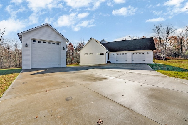 exterior space with a detached garage