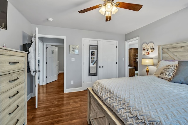 bedroom featuring dark wood-style floors, a closet, baseboards, and a ceiling fan