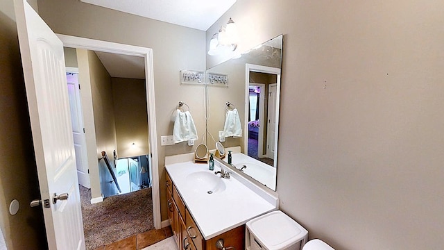 half bath with toilet and vanity