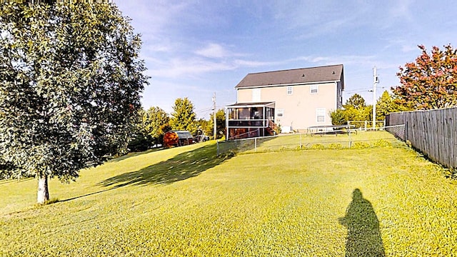 view of yard featuring fence