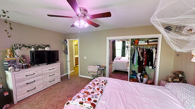 bedroom with dark colored carpet, a closet, a ceiling fan, and baseboards