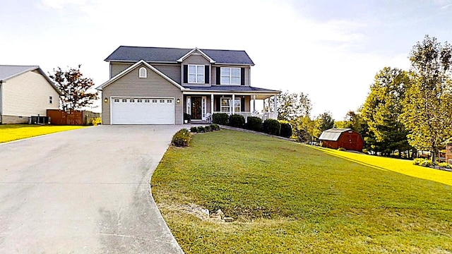 traditional-style house with covered porch, a front lawn, and concrete driveway