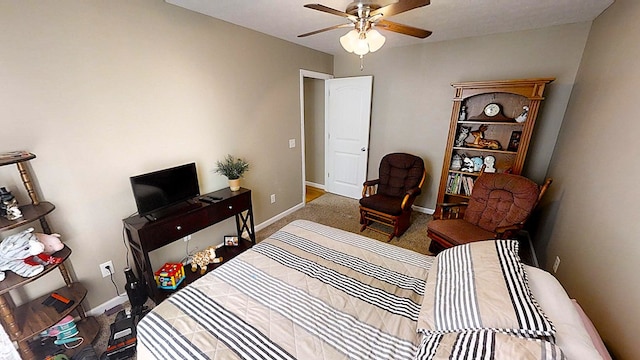 bedroom featuring dark colored carpet, a ceiling fan, and baseboards